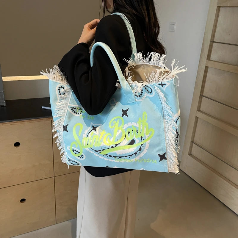 K-LetterCharm® – Korean-Inspired Canvas Tote Bag with Letter Print & Tassel Accent